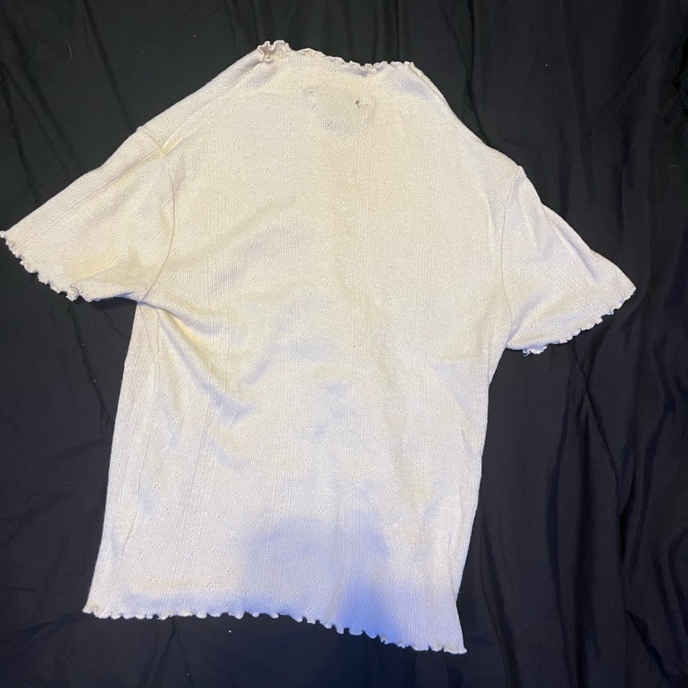 tight t-shirt, cream colored